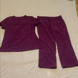 Infinity Two-Piece scrubs. Bright burgundy color.